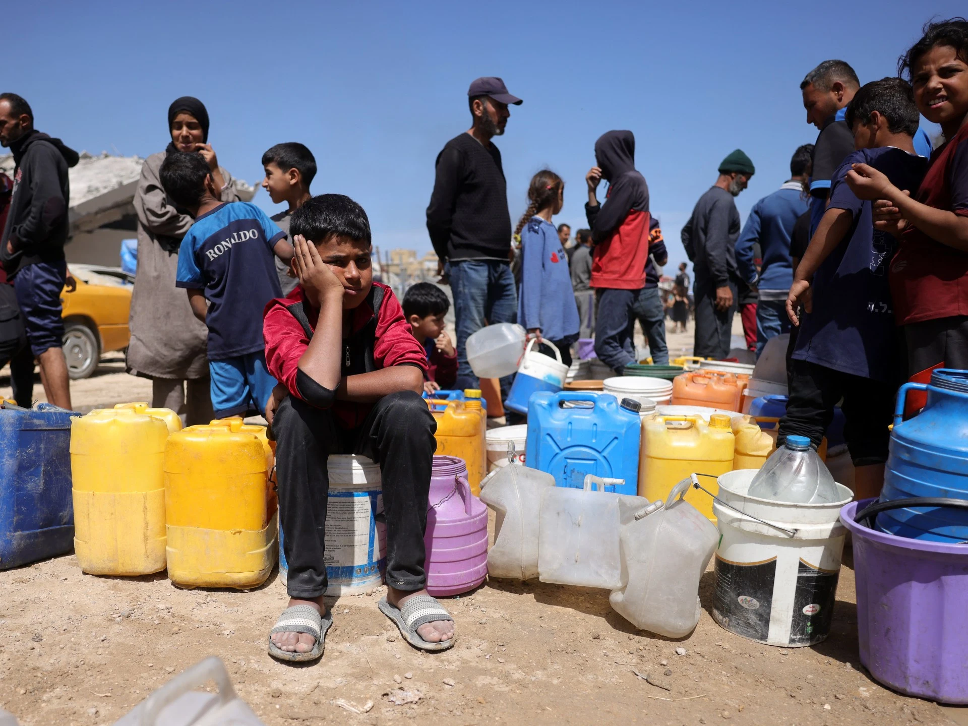 Child waiting for water relief